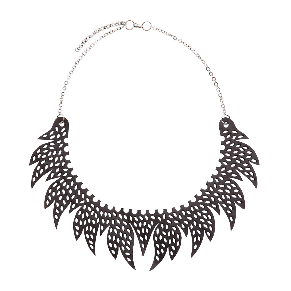 Paguro Upcycle black upcycled inner tube necklace with leaf-shaped cutout design and silver chain