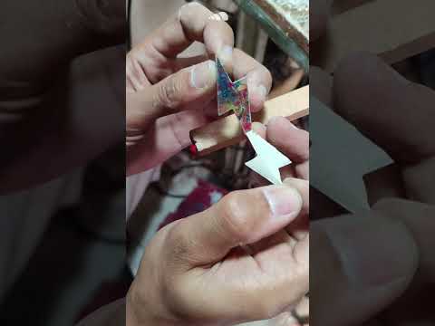 Watch how our resin and reclaimed wood-shaving earrings are handmade
