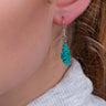 Model wearing the Isla recycled electrical wire earrings