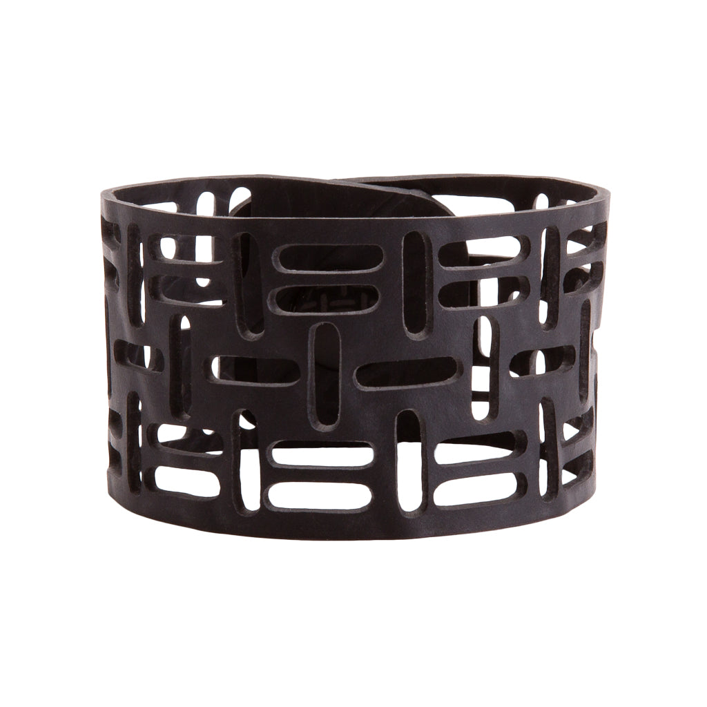 Paguro Upcycle recycled rubber bracelet with geometric cutout design in black