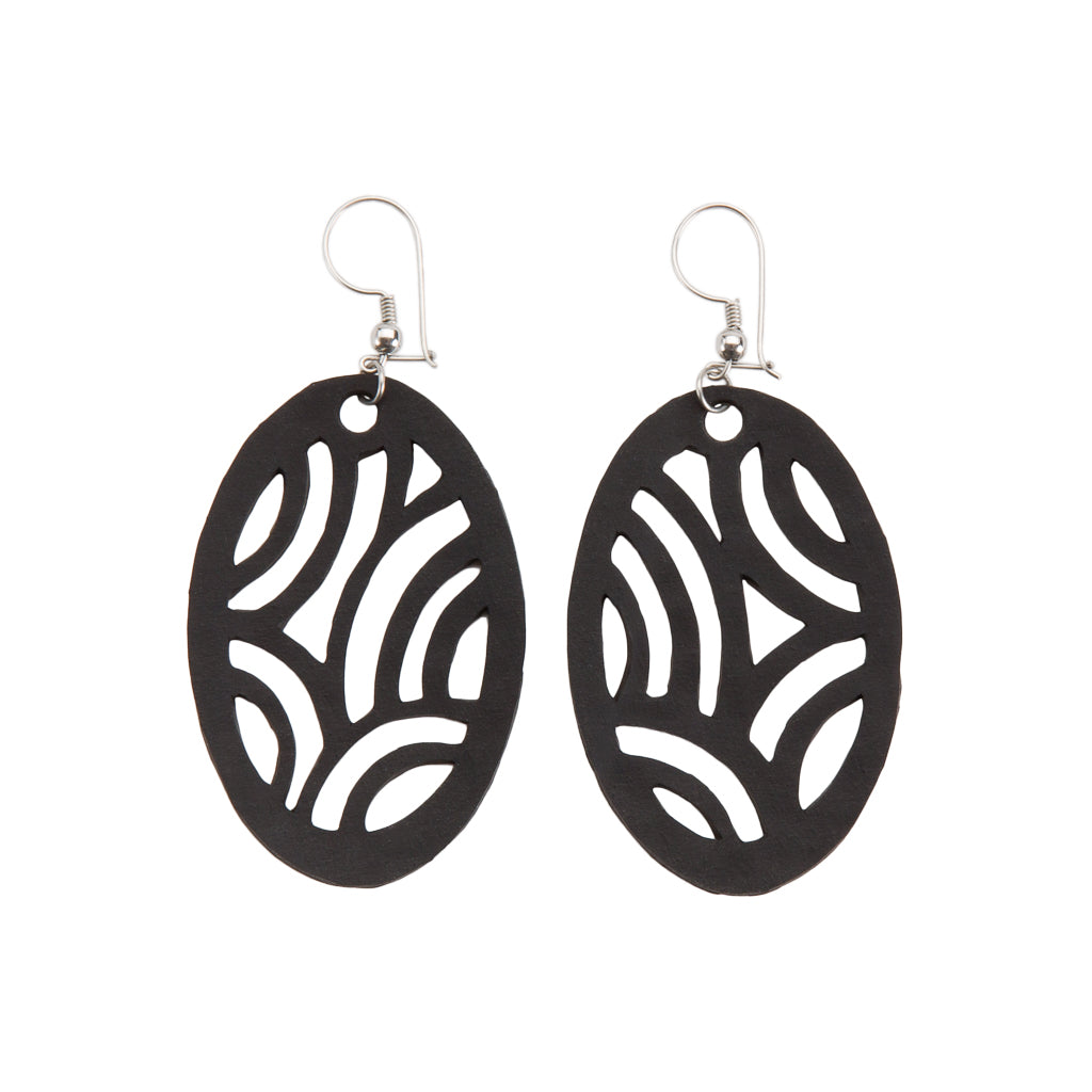 Paguro Upcycle black oval dangle recycled rubber earrings with carved wave cutout pattern and fishhook wires
