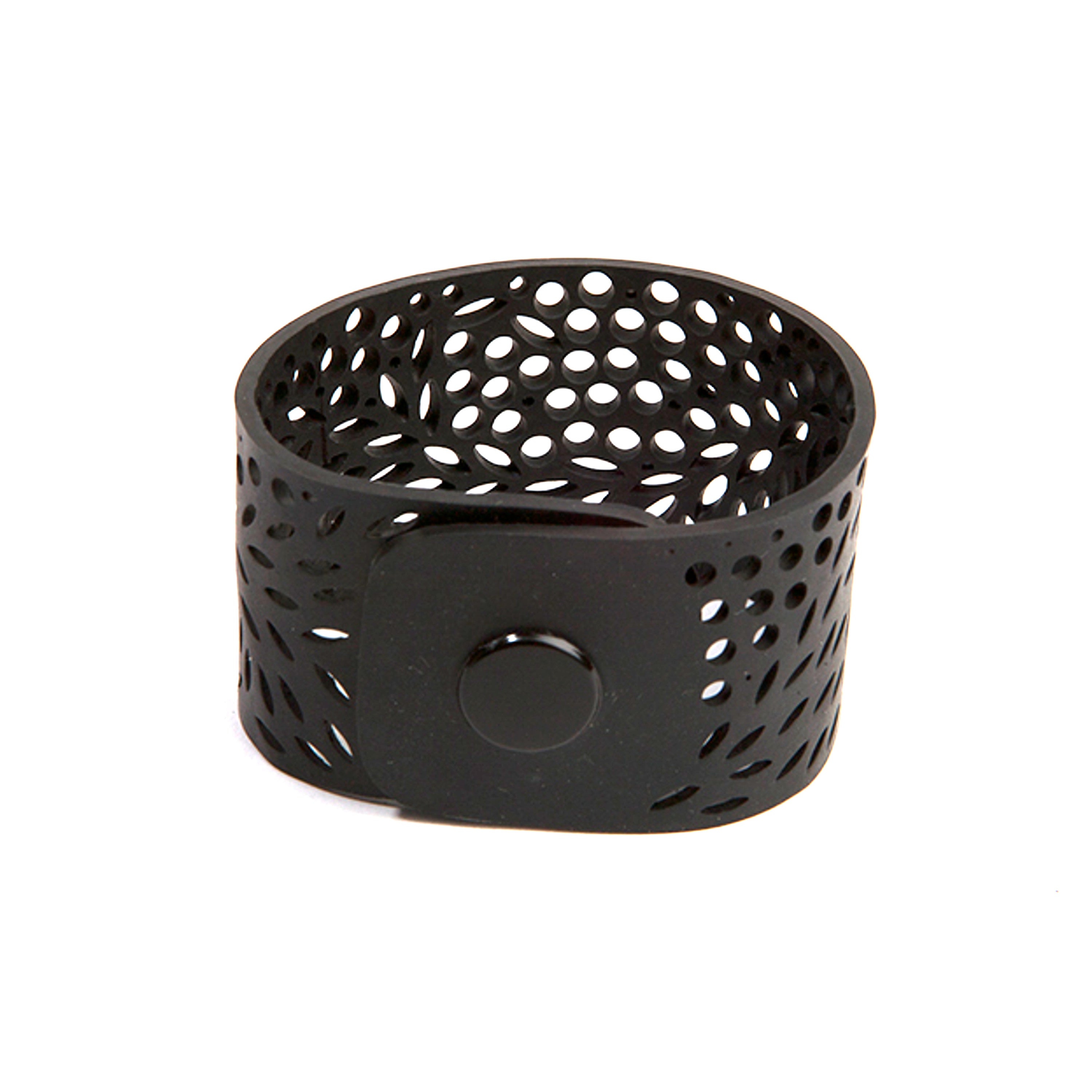 Paguro Upcycle black recycled rubber bracelet with circular cutout design and button clasp