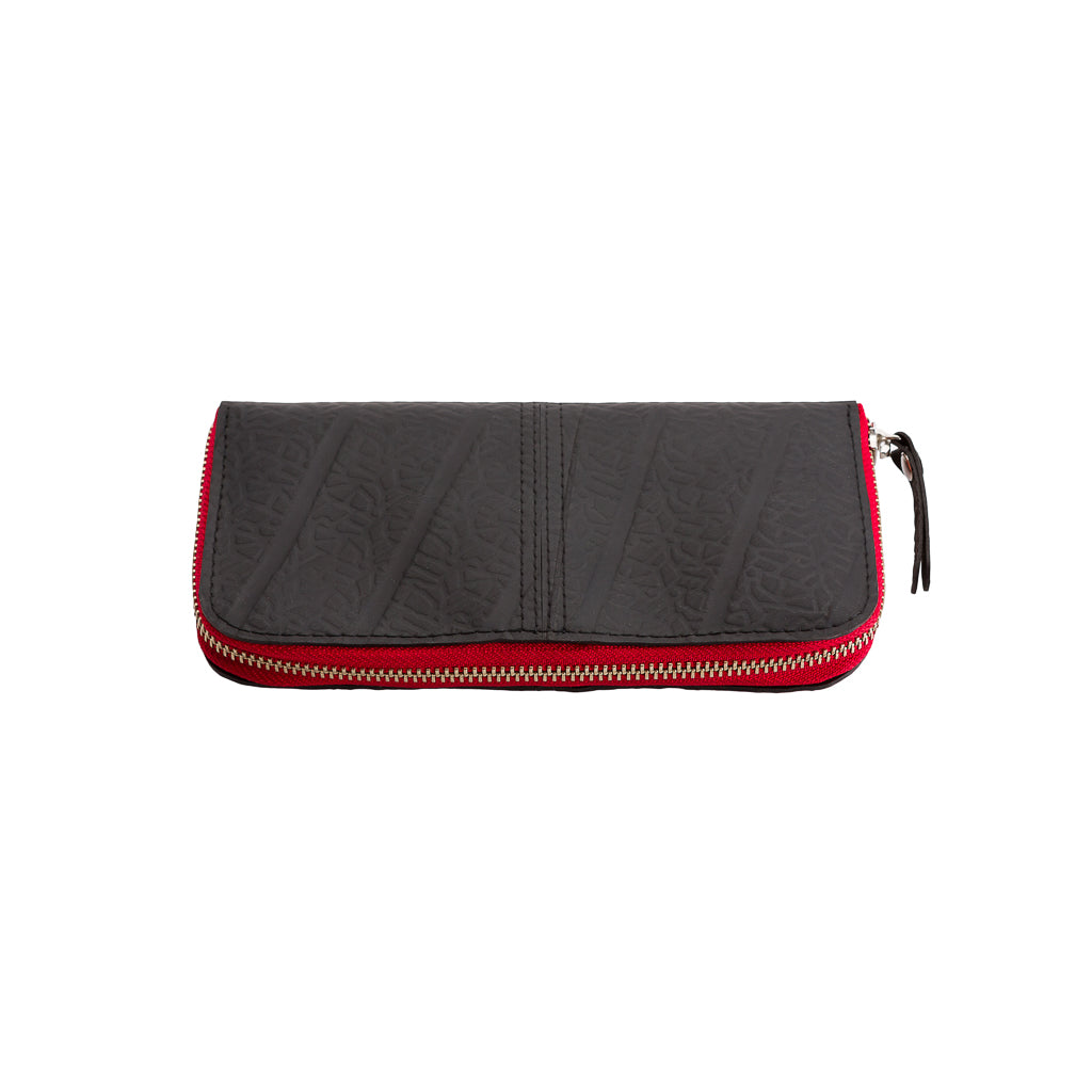 Paguro Upcycle vegan long zip purse in black with red zipper and textured design