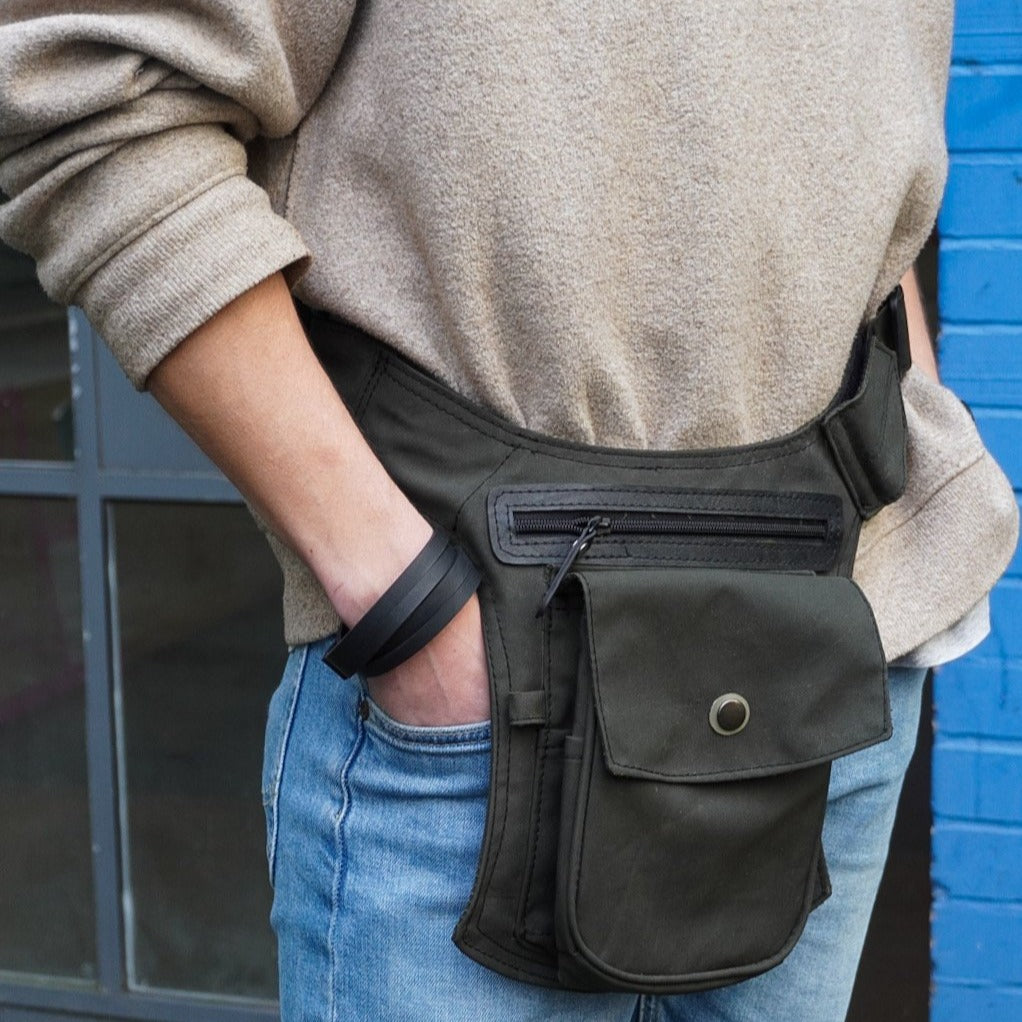 Paguro Upcycle recycled canvas crossbody bag bum bag worn with casual beige sweater and jeans