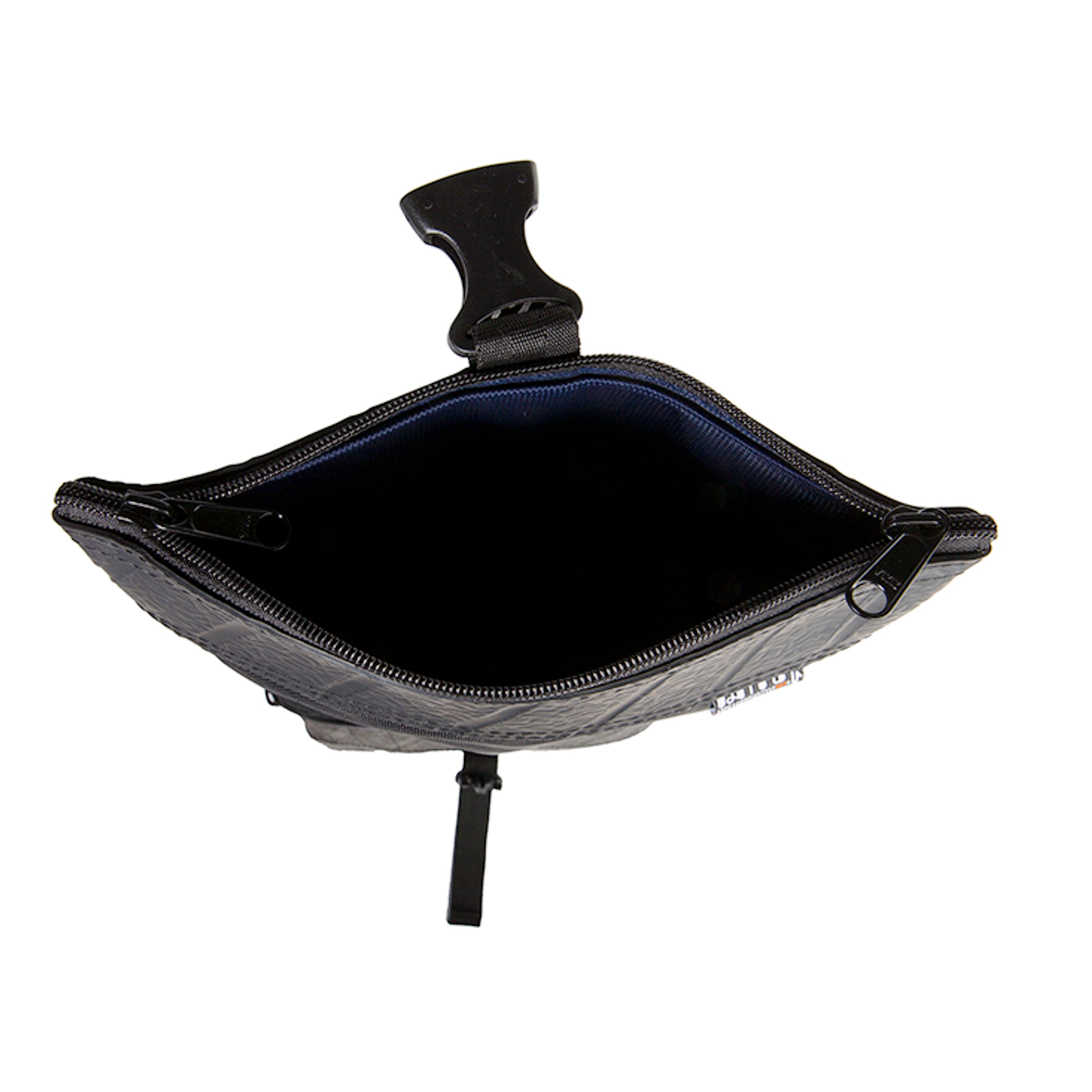 Open black recycled rubber crossbody bag by Paguro Upcycle showing spacious interior and zipper closure