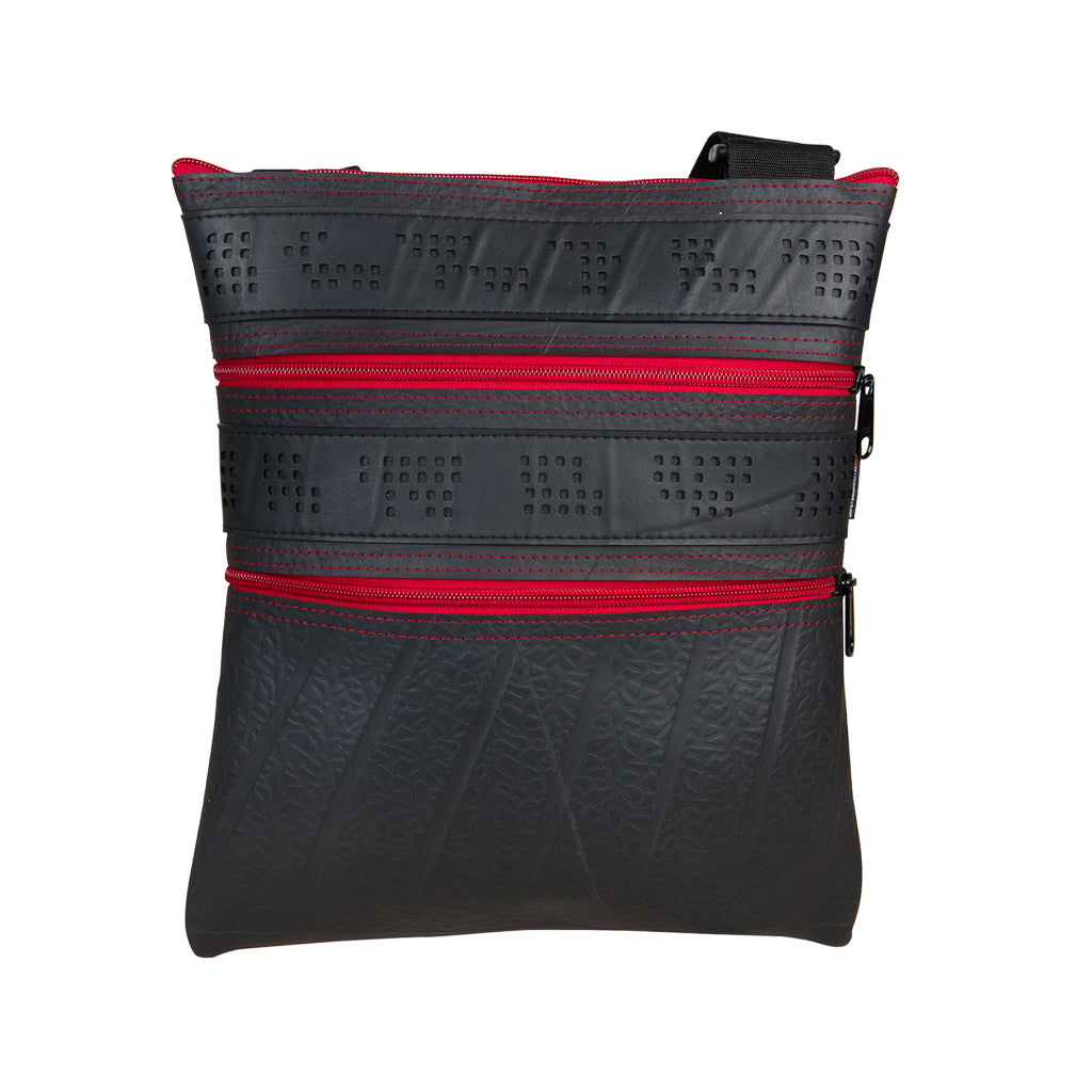Paguro Upcycle recycled rubber vegan handbag in black with red zippers and eco-friendly design