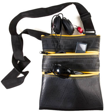 Paguro Upcycle recycled rubber vegan handbag in black with multiple zippered compartments and adjustable strap