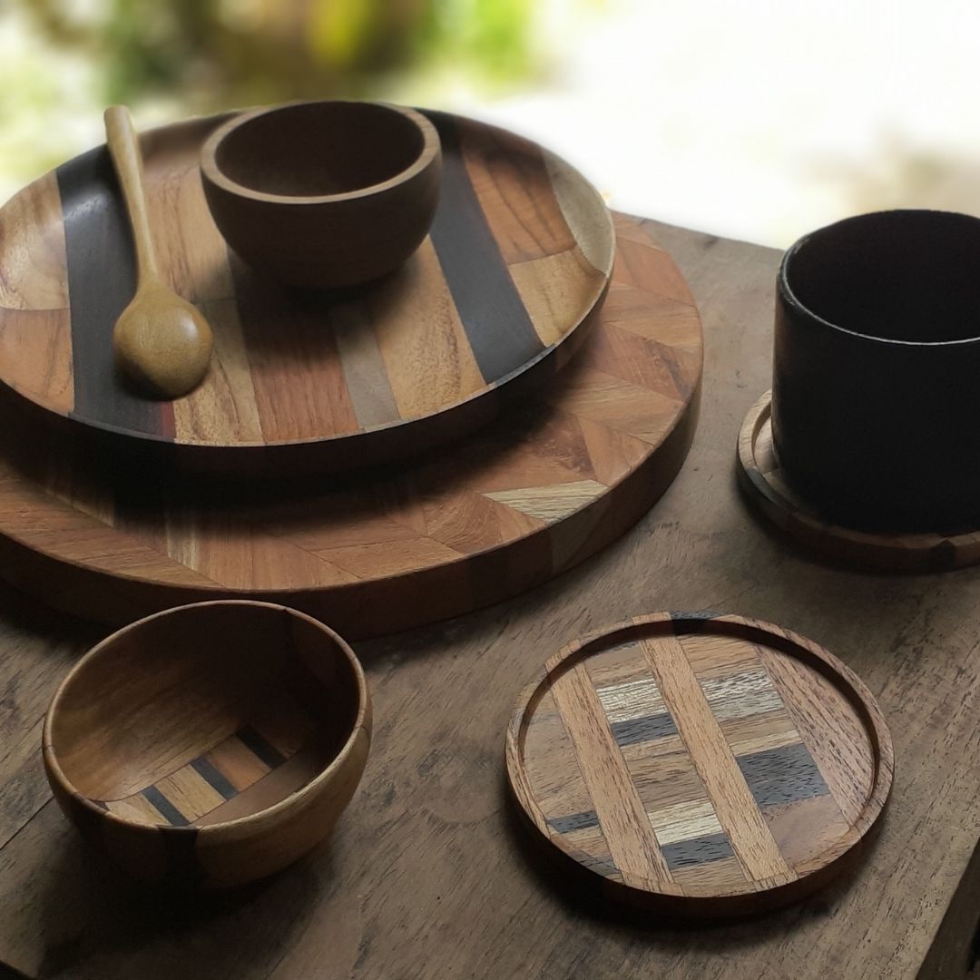 Paguro Upcycle upcycled wooden mini bowl displayed with matching wooden plates and spoon on rustic table