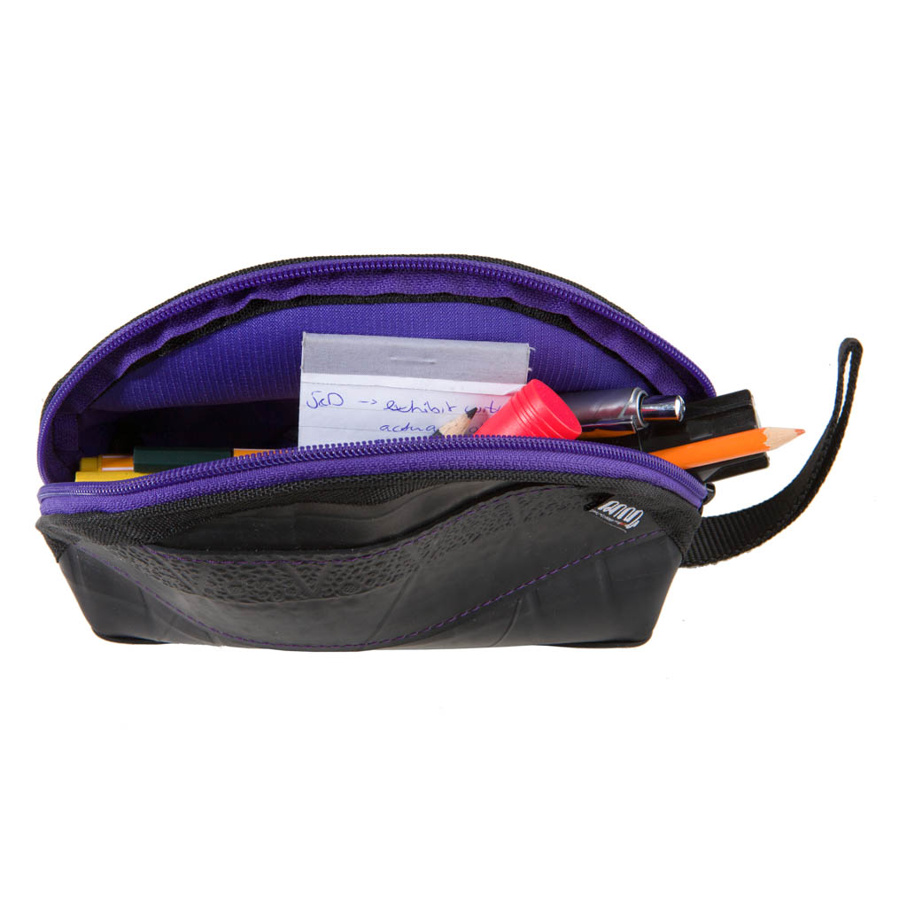 Paguro Upcycle black and purple vegan travel pouch filled with stationery items and organized compartments